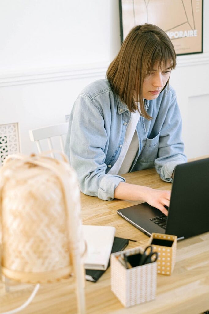 Woman Using Laptop Computer